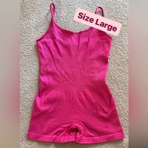 OQQ Pink Bodysuit. Size large - runs small!
